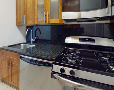 401 E 34th St - Photo Thumbnail 1
