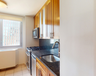 401 E 34th St - Photo Thumbnail 1