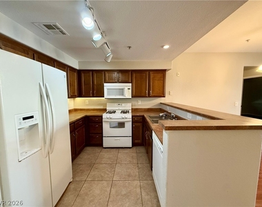 8777 W Maule Avenue - Photo Thumbnail 3
