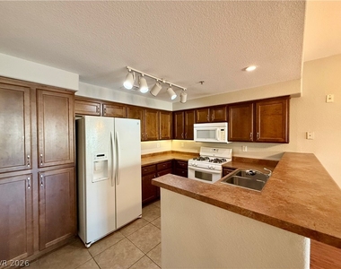 8777 W Maule Avenue - Photo Thumbnail 1