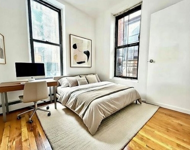 370 West 52nd Street - Photo Thumbnail 1