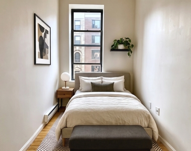 215 East 118th Street - Photo Thumbnail 2