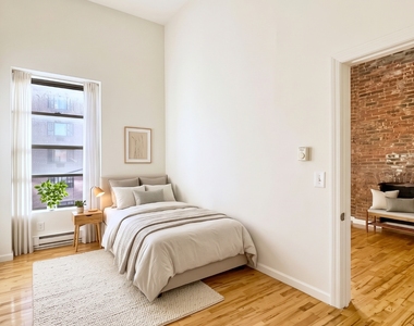 215 East 118th Street - Photo Thumbnail 1