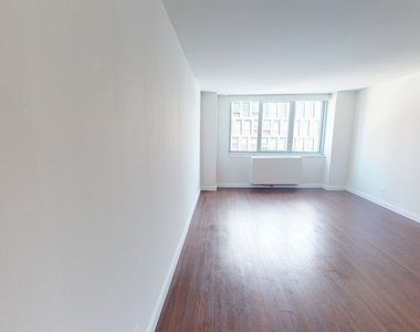 401 E 34th St - Photo Thumbnail 1