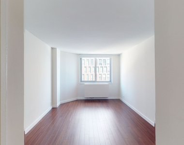 401 E 34th St - Photo Thumbnail 3