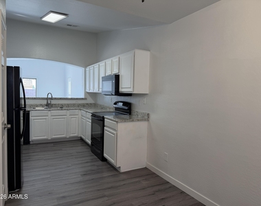 1833 S 106th Lane - Photo Thumbnail 2