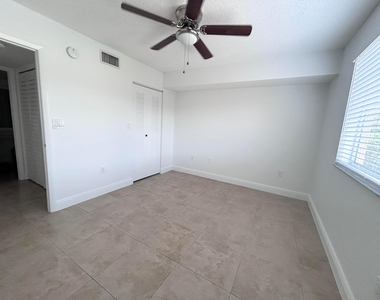 771 N Pine Island Road - Photo Thumbnail 4