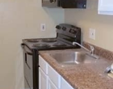 105 E Tyler Street - Photo Thumbnail 2
