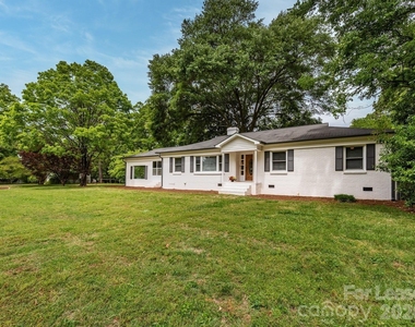 1301 N Sharon Amity Road - Photo Thumbnail 1