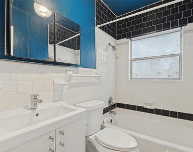 8714 Forest Hills Boulevard - Photo Thumbnail 12