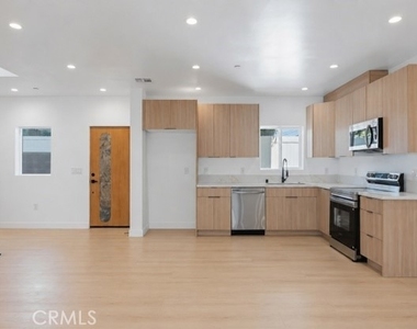 7702 Lasaine Avenue - Photo Thumbnail 1