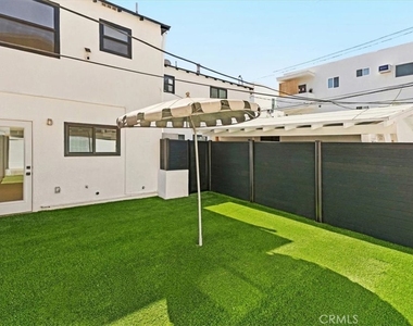 1427 N Bronson Ave - Photo Thumbnail 5