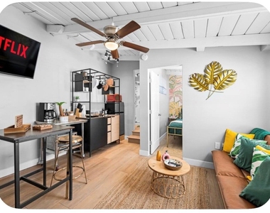 5061 Warner Avenue - Photo Thumbnail 2