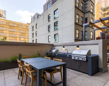 560 West 43rd Street - Photo Thumbnail 4