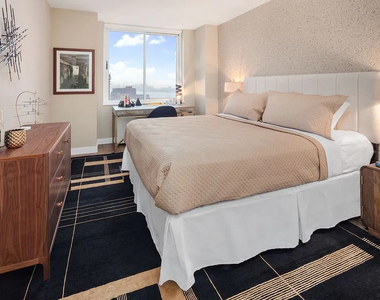 560 West 43rd Street - Photo Thumbnail 1