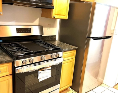 82-81 88th Pl - Photo Thumbnail 4