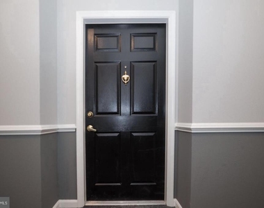 1521 Spring Gate Drive - Photo Thumbnail 2