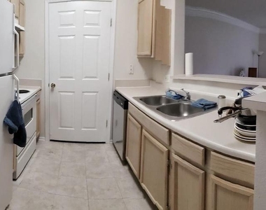 1521 Spring Gate Drive - Photo Thumbnail 6