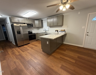 715 E River Road - Photo Thumbnail 2