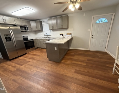 715 E River Road - Photo Thumbnail 3