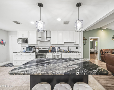 3660 Mandarin Woods Drive N - Photo Thumbnail 3