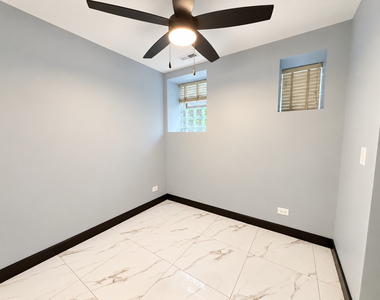 442 E 48th Street - Photo Thumbnail 3