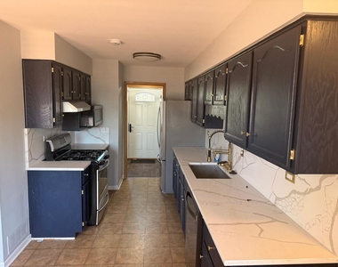 9336 Moody Avenue - Photo Thumbnail 10
