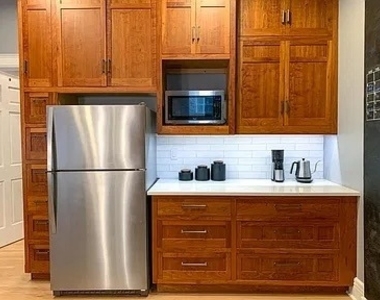 1409 N Campbell Avenue - Photo Thumbnail 2
