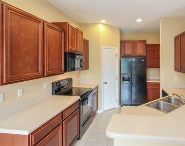 16515 Kingletridge Avenue - Photo Thumbnail 2