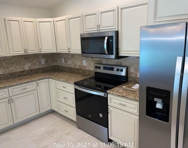 5999 Rhapsody Avenue - Photo Thumbnail 4
