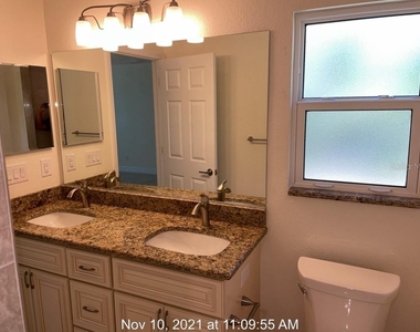 5999 Rhapsody Avenue - Photo Thumbnail 9
