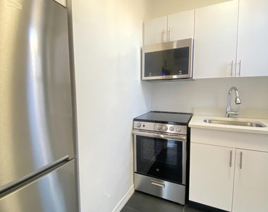 W 73rd St - Photo Thumbnail 1