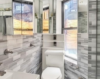 East 106th Street - Photo Thumbnail 3