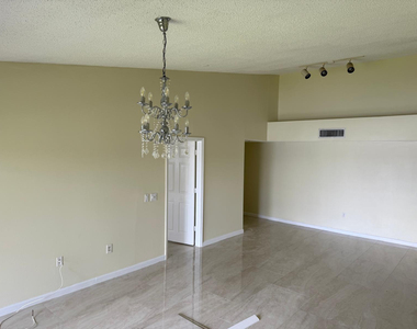 5061 Wiles Road - Photo Thumbnail 10