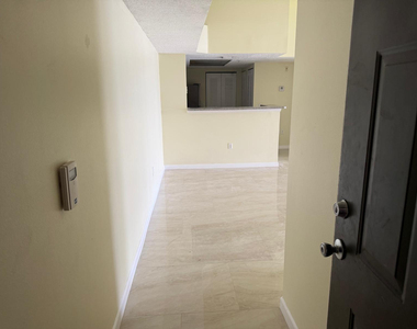 5061 Wiles Road - Photo Thumbnail 2