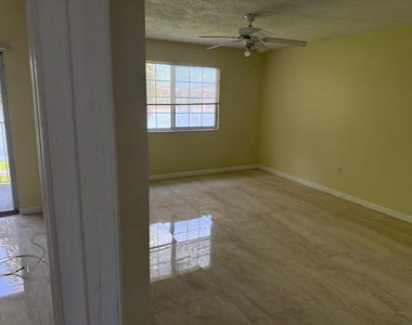 5061 Wiles Road - Photo Thumbnail 16