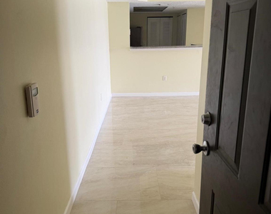 5061 Wiles Road - Photo Thumbnail 4