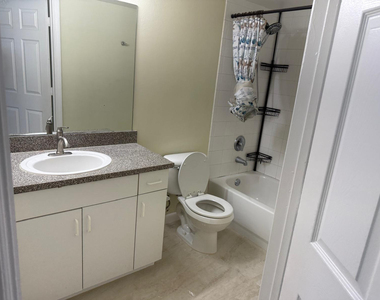5061 Wiles Road - Photo Thumbnail 20