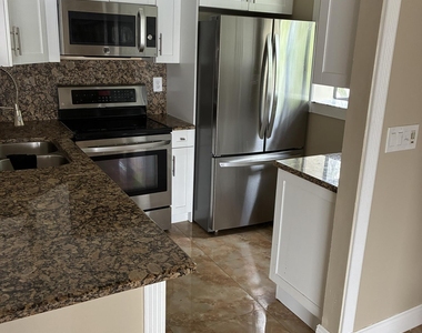 2749 S Oakland Forest Drive S - Photo Thumbnail 2