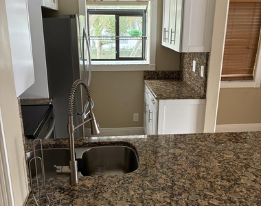 2749 S Oakland Forest Drive S - Photo Thumbnail 3