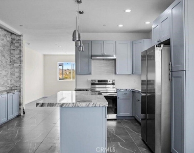 7608 Olympic - Photo Thumbnail 2