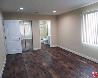 1334 W 62 - Photo Thumbnail 2