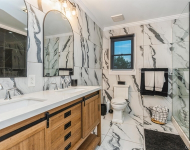 1402 Merrick Avenue - Photo Thumbnail 16