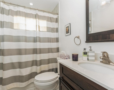 1402 Merrick Avenue - Photo Thumbnail 5
