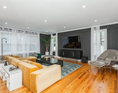 1402 Merrick Avenue - Photo Thumbnail 1