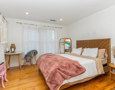 1402 Merrick Avenue - Photo Thumbnail 21