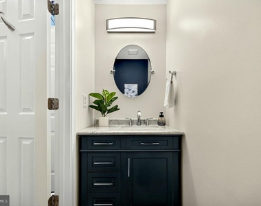 8006 Trevor Place - Photo Thumbnail 4