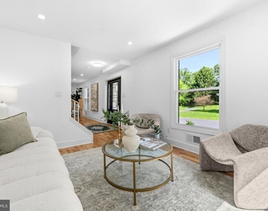 9828 Watts Branch Drive - Photo Thumbnail 1