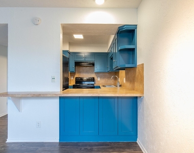 5506 Grover Ave - Photo Thumbnail 3