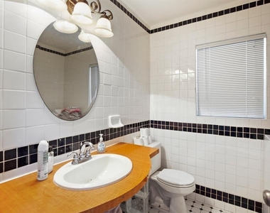 910 E 51st St - Photo Thumbnail 6